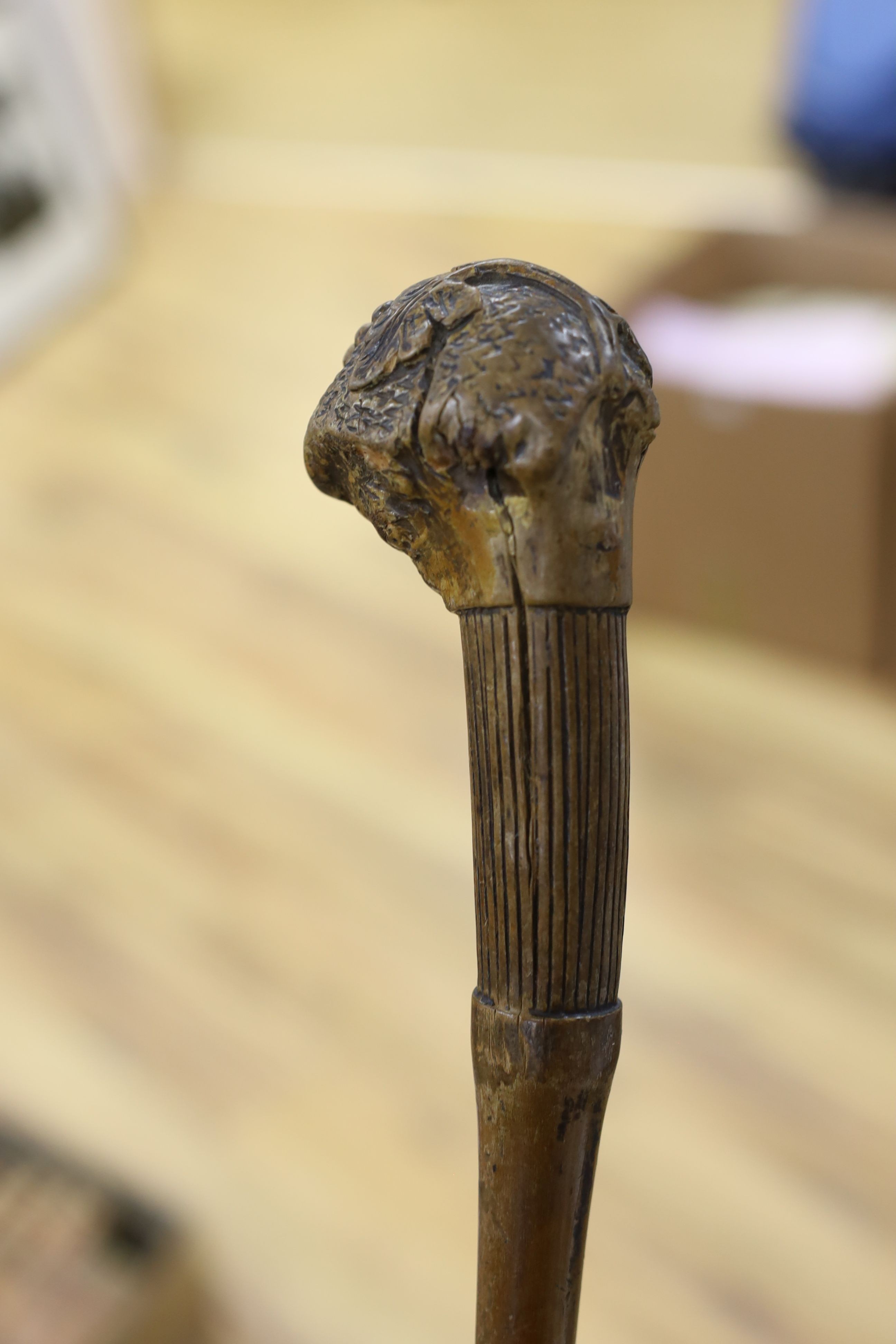 A 19th century folk art walking stick, 89 cms long.